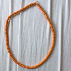 Orange bead necklace
